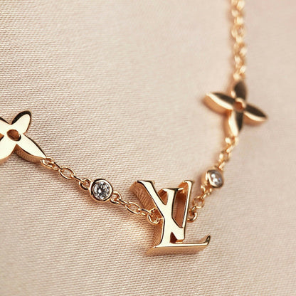 [Star Jewelry]STAR AND SUN 7 MOTIFS GOLD BRACELET