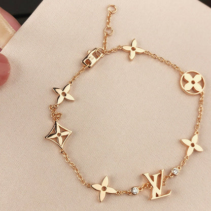 [Star Jewelry]STAR AND SUN 7 MOTIFS GOLD BRACELET