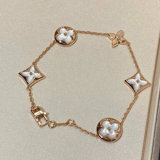 [Star Jewelry]STAR AND SUN 5 MOTIF MOP PINK GOLD BRACELET