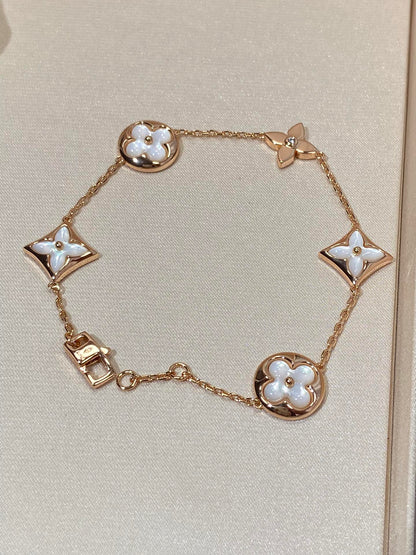 [Star Jewelry]STAR AND SUN 5 MOTIF MOP PINK GOLD BRACELET
