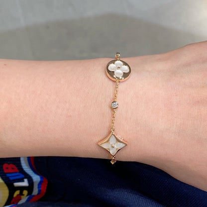 [Star Jewelry]STAR AND SUN 4 MOTIF WHITE MOP PINK GOLD BRACELET