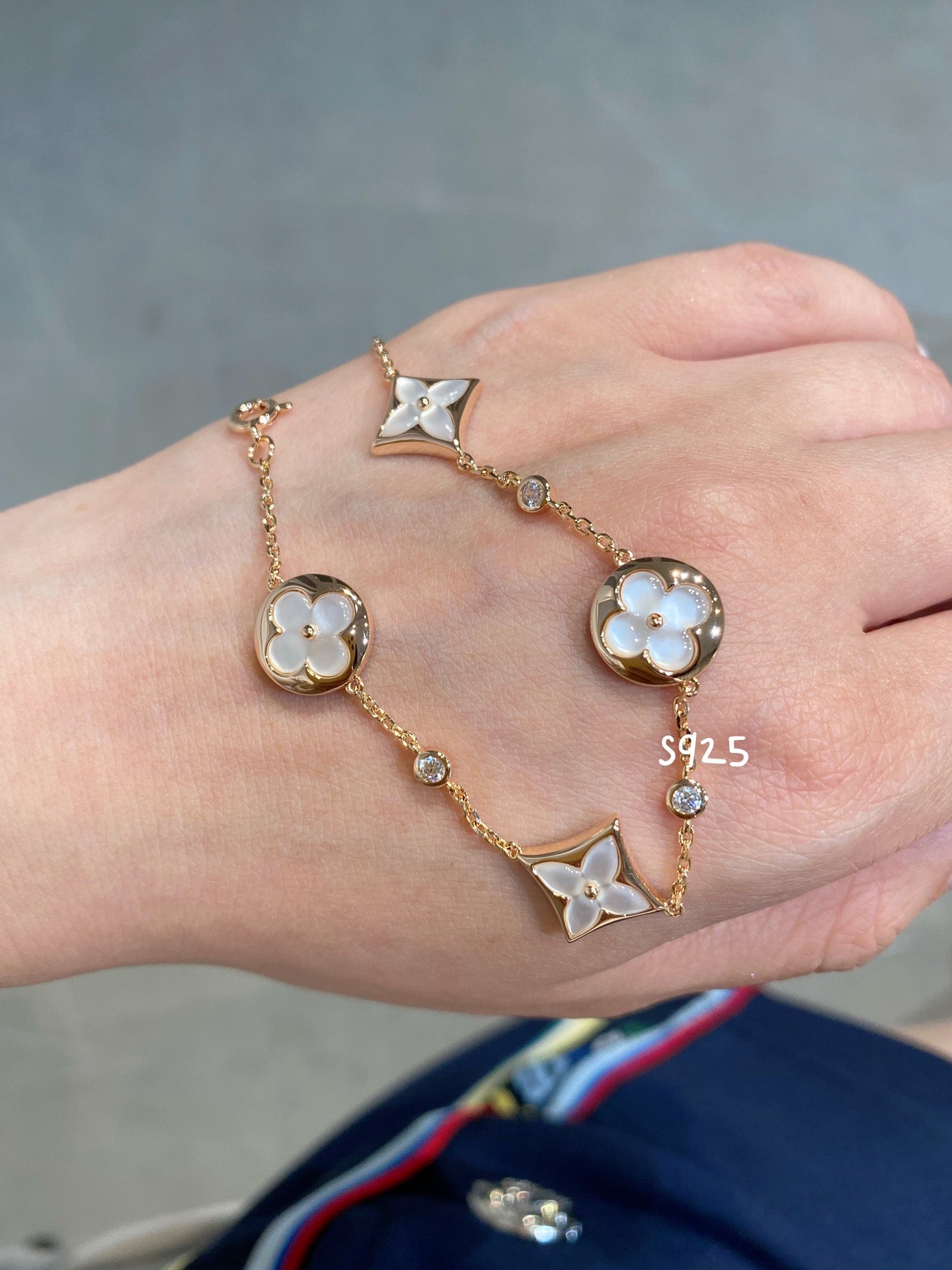 [Star Jewelry]STAR AND SUN 4 MOTIF WHITE MOP PINK GOLD BRACELET