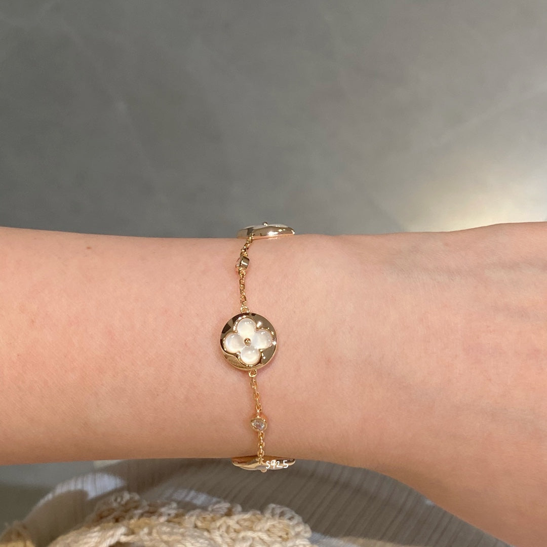 [Star Jewelry]STAR AND SUN 4 MOTIF WHITE MOP PINK GOLD BRACELET