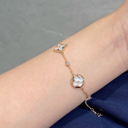 [Star Jewelry]STAR AND SUN 4 MOTIF WHITE MOP PINK GOLD BRACELET