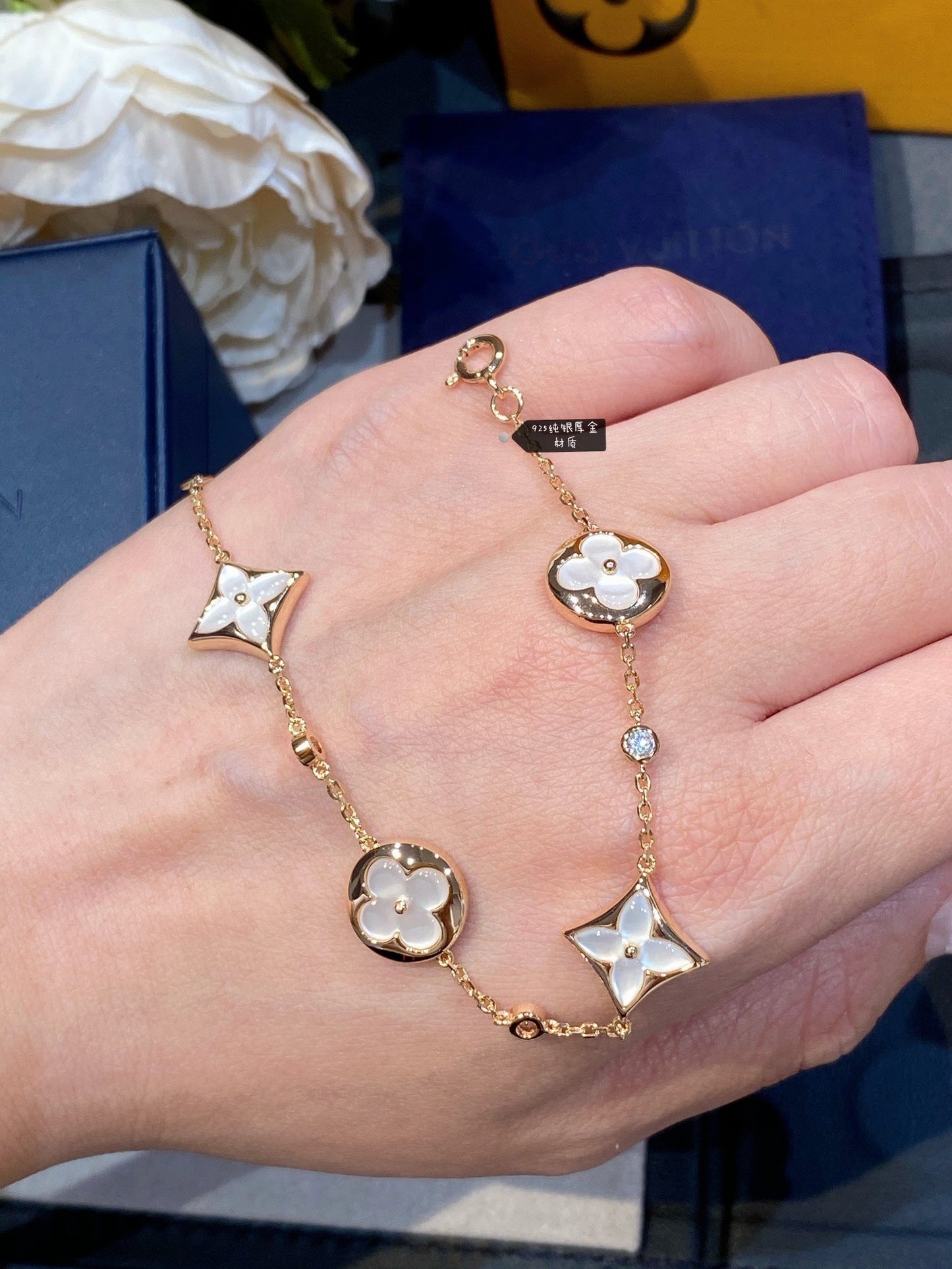 [Star Jewelry]STAR AND SUN 4 MOTIF WHITE MOP PINK GOLD BRACELET