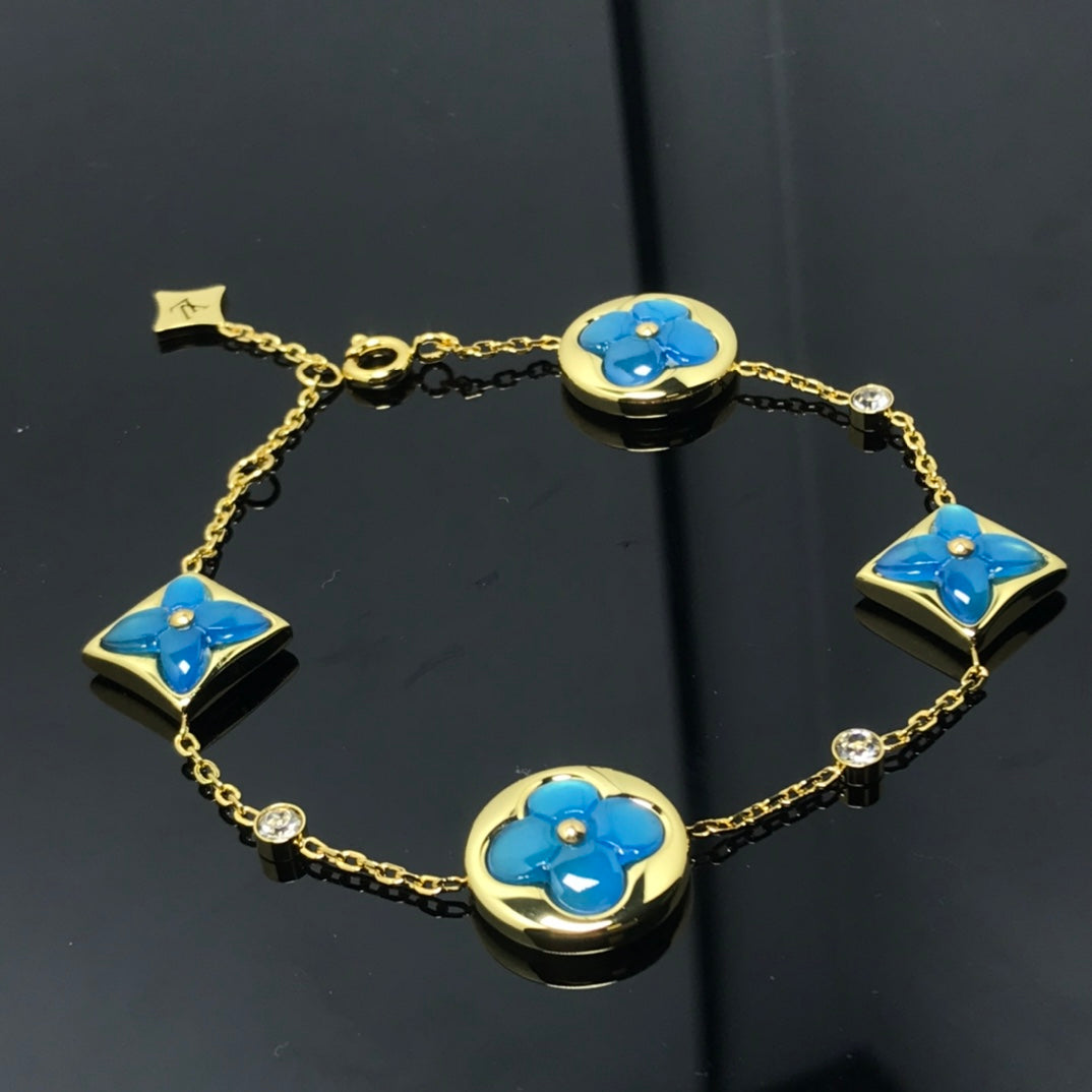 [Star Jewelry]STAR AND SUN 4 MOTIF BLUE BRACELET